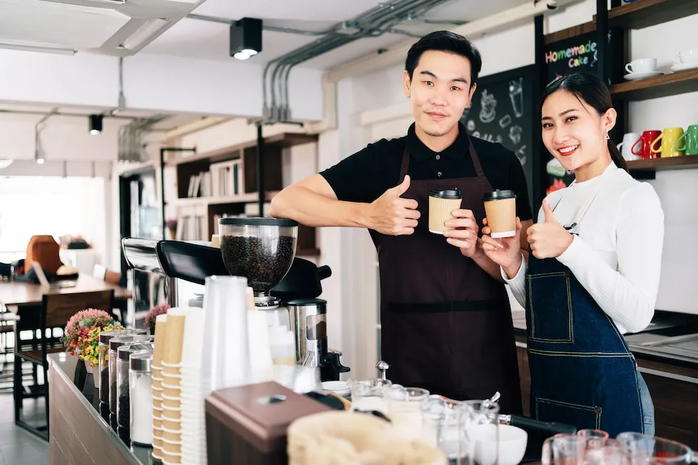 young-male-female-barista-cafe-o